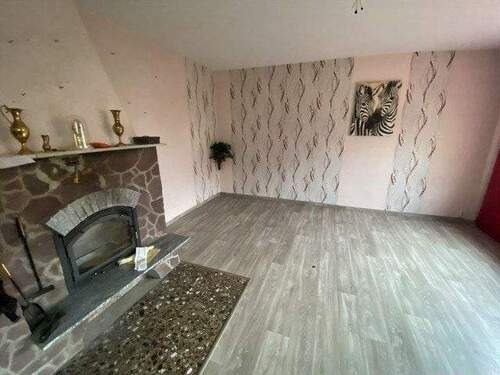 Wohnzimmer mit Kamin - 