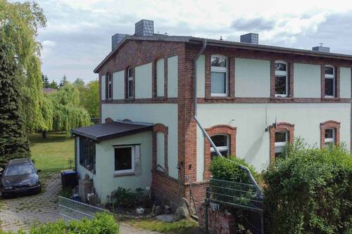 Ansicht von der Straße - Doppelhaushälfte in Werder - für ein naturverbundenes und selbstbestimmtes Familienleben