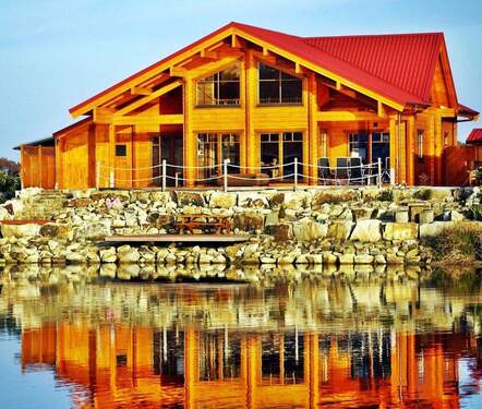 Bild 1 - Freistehendes Blockbohlenhaus direkt am See