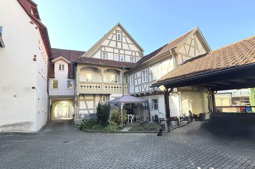Hausansicht Innenhof - Vermietete, charmante 2-Zimmer-Erdgeschosswohnung in denkmalgeschütztem Gebäude in Lauffen am Neckar