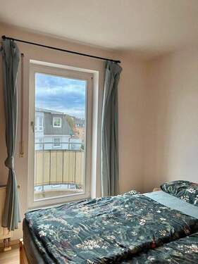Schlafzimmer mit Balkon - 