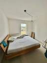 Schlafzimmer mit Balkon - 