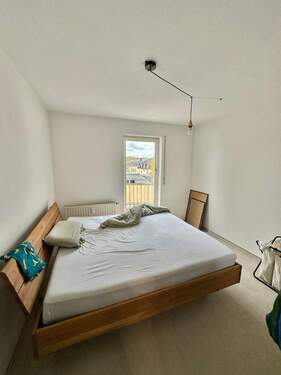 Schlafzimmer mit Balkon - 