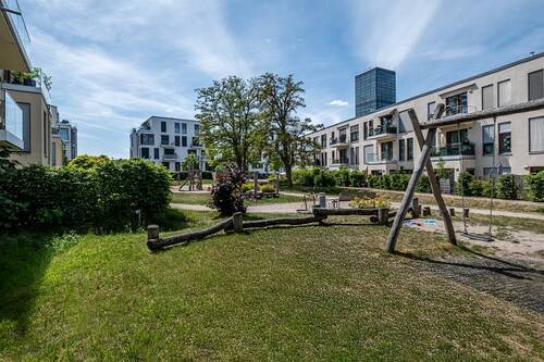 Gemeinschaftsgarten mit Spielplatz - 
