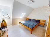 Gemütliches Schlafzimmer im Dachgeschoss - 