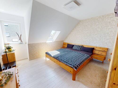 Gemütliches Schlafzimmer im Dachgeschoss - 