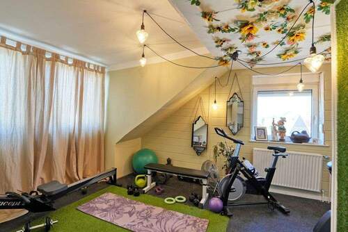 Zimmer im Dachgeschoss - 