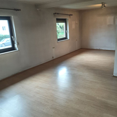 Wohnzimmer - Einfamilienhaus mit 100,00 m² in Rosenheim zum Kaufen