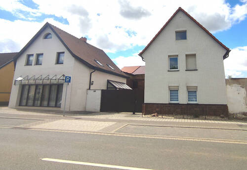 Hausansicht Straße - Einfamilienhaus mit 197,00 m² in Bitterfeld-Wolfen zum Kaufen
