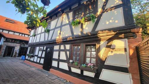 Seitenansicht Haus / Innenhof - 