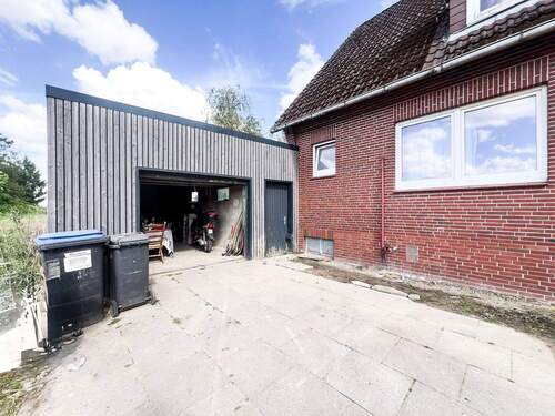 Garage - Einfamilienhaus mit 449,00 m&sup2; in Stade zum Kaufen