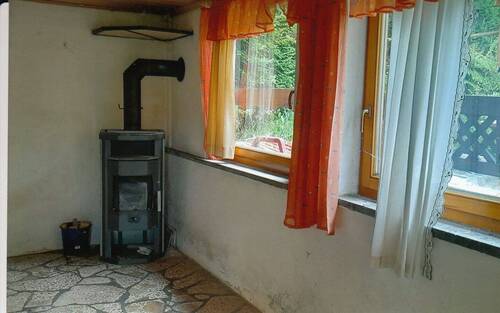 Partyraum mit Kaminofen im EG - 