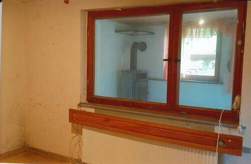 Wohnraum mit Blick in Partyraum - 