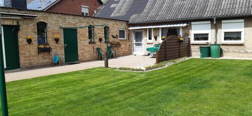 Blick auf die Terrasse - Einfamilienhaus mit 156,00 m&sup2; in Erfde zum Kaufen