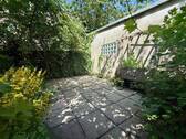 Garten mit weiterer Terrasse - 