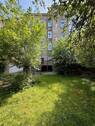 Hausansicht hinten mit Garten - 1 Zimmer Mehrfamilienhaus, Wohnhaus in Kiel