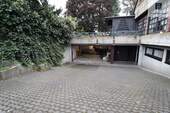 Doppelgarage mit Stellplätzen - 