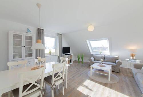 Wohnzimmer Wohnung DG - Strandallee: 1 Wohnung 2 Einheiten, 2 lukrative Ferienwohnungen