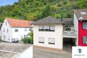 Außenansicht - Familienfreundliches Einfamilienhaus mit Kamin, Garten & Garage in ruhiger Lage - jetzt entdecken!