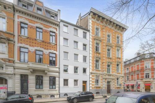 Titelbild - 8-Parteienhaus mit top Raumaufteilung und Betondecken inmitten des Frankenbergerviertels