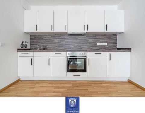 EBK - Charmante Neubauwohnung mit hofseitigem Balkon, Fußbodenheizung, EBK, Gäste-WC!
