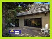 Terrassenseite - Verden-Walle - Bungalow mit Garage, Vollkeller, auf 944 m² großen Waldgrundstück