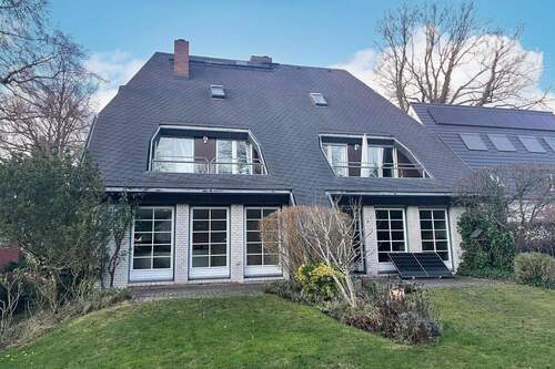 Ansicht vom Garten aus - Exklusive Gartenwohnung in begehrter Elblage: 3-Zimmer-ETW, 2 Bäder, Einzelgarage