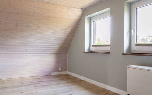 Zimmer im Dachgeschoss - 