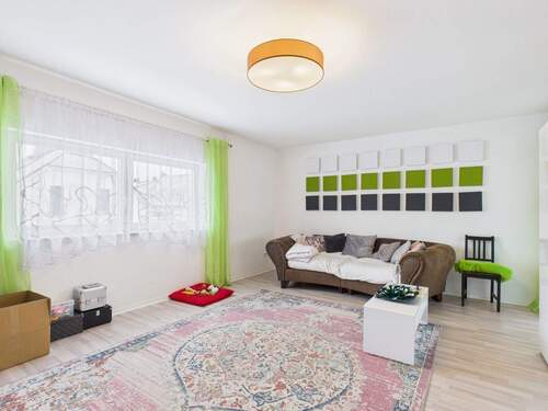 Wohnzimmer Obergeschoss - Mehrfamilienhaus, Wohnhaus mit 189,00 m&sup2; in Hasselroth zum Kaufen