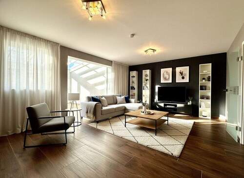 Wohnzimmer virtuell möbliert - 4 Zimmer Reihenendhaus zum Kaufen in Osnabrück