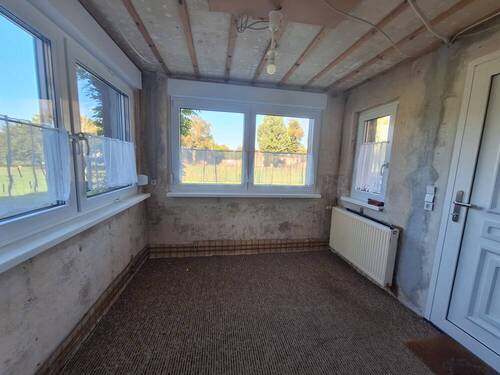 Veranda - 4 Zimmer Doppelhaushälfte zum Kaufen in Tauche / Falkenberg