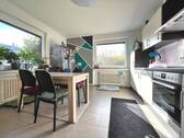 Ein Raum, der Kochen und Wohnen vereint - 