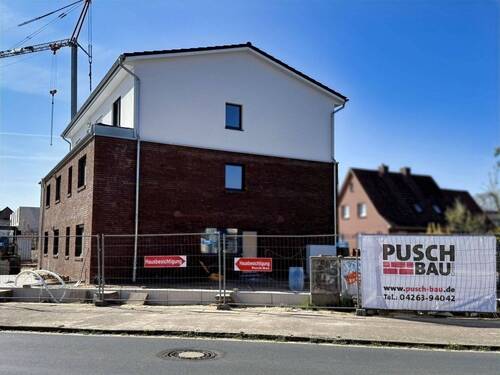 Giebelansicht Hauseingang (Beispiel Haus 1) - 3 Zimmer Etagenwohnung zum Kaufen in Scheeßel