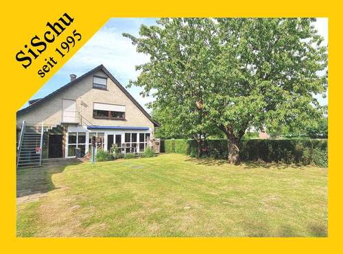 Ansicht Garten - Zweifamilienhaus in idyllischer Sackgassenlage direkt am Fluss