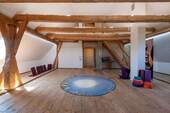 Dachstudio mit Sichtdachstuhl - 