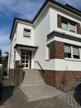 Gebäudeansicht vorne - 1 Zimmer Doppelhaushälfte zum Kaufen in Dinslaken