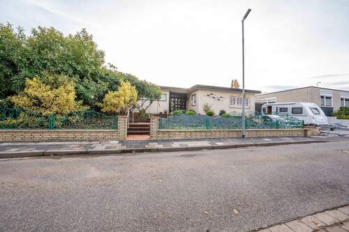 Hausansicht - Bungalow mit 134?m² Wohnfläche, stilvolle Architektur und Wohlfühlkomfort auf einer Ebene