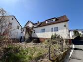 Hausansicht und Garten - Ihr Projekt fürs Eigenheim: Haus mit Garten, Garage und Nebengebäude