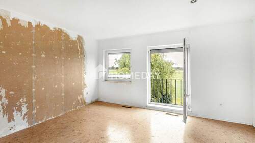 1. OG Schlafzimmer 1 - 