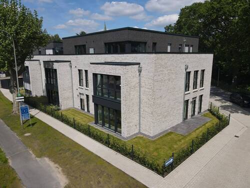 Außenansicht - Stilvolle Neubauwohnung mit 4 Zimmern, Terrasse und Garten zu verkaufen!