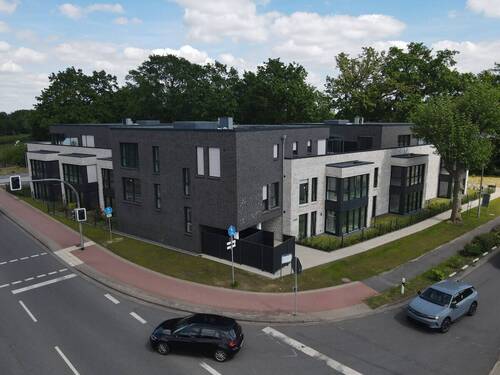 Außenansicht Mehrfamilienhaus - 4 Zimmer Etagenwohnung zum Kaufen in Haselünne