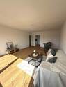 Wohnzimmer - Moderne, Kernsanierte 3 Zimmer Wohnung zum Erstbezug und Provisionsfrei