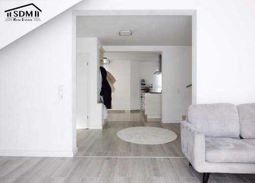 03_Wohnzimmer_Eingangsbereich.jpg - Doppelhaushälfte mit 234,00 m&sup2; in Philippsburg zum Kaufen