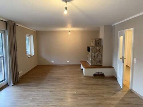 Wohnzimmer mit Kachelofen - 