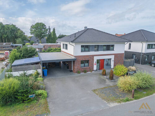 Bild 1 - Verkauf: Modernes Einfamilienhaus in Dinklage mit großem Garten & Outdoorkitchen !