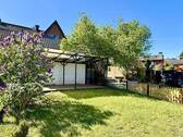 Gartengrundstück mit überdachter Terrasse - 