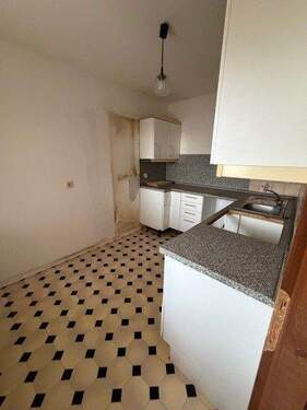 Blick in die Küche.jpg - Etagenwohnung mit 62,00 m&sup2; in München zum Kaufen