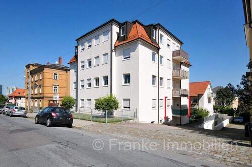 Hausansicht Südostseite - Wölfnitz - komfortable 1-Zi.-Wohnung mit EBK, Balkon u. Tiefgarage