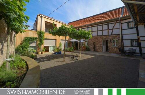 Bild 1 - Außergewöhnliche Terrassenwohnung im Zentrum von Heimerzheim zu mieten