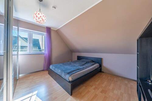 Das zweite Schlafzimmer im OG - 